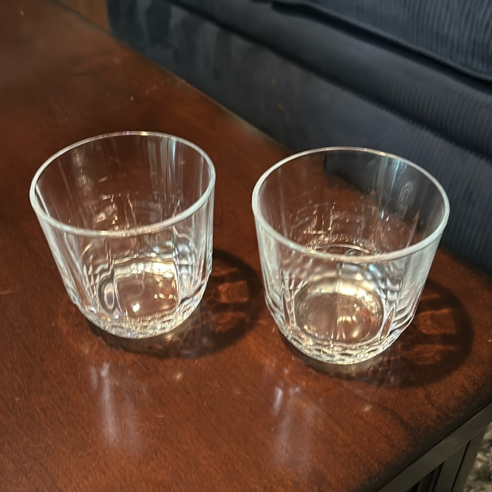 Set of two clear glass rocks glasses with decorative cut glass bottom